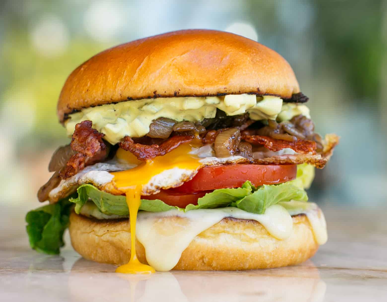 egg-bacon-cheese-burger-beer-onions-and-american-mustard-mayo