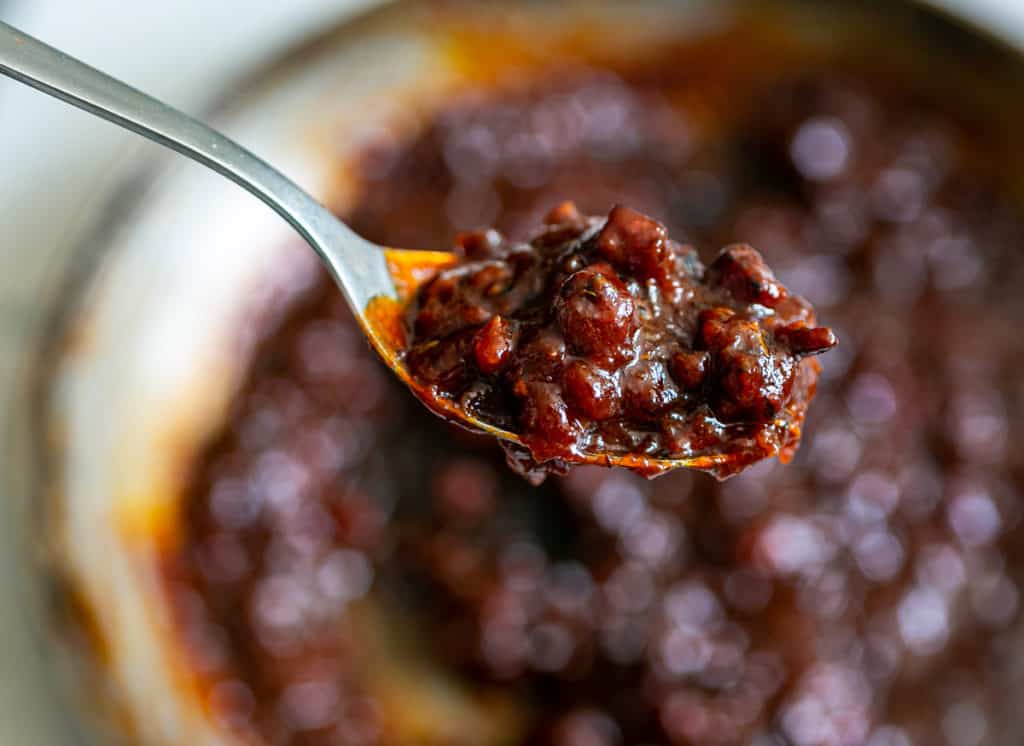 a spoon with Bacon Jam with BBQ Sauce