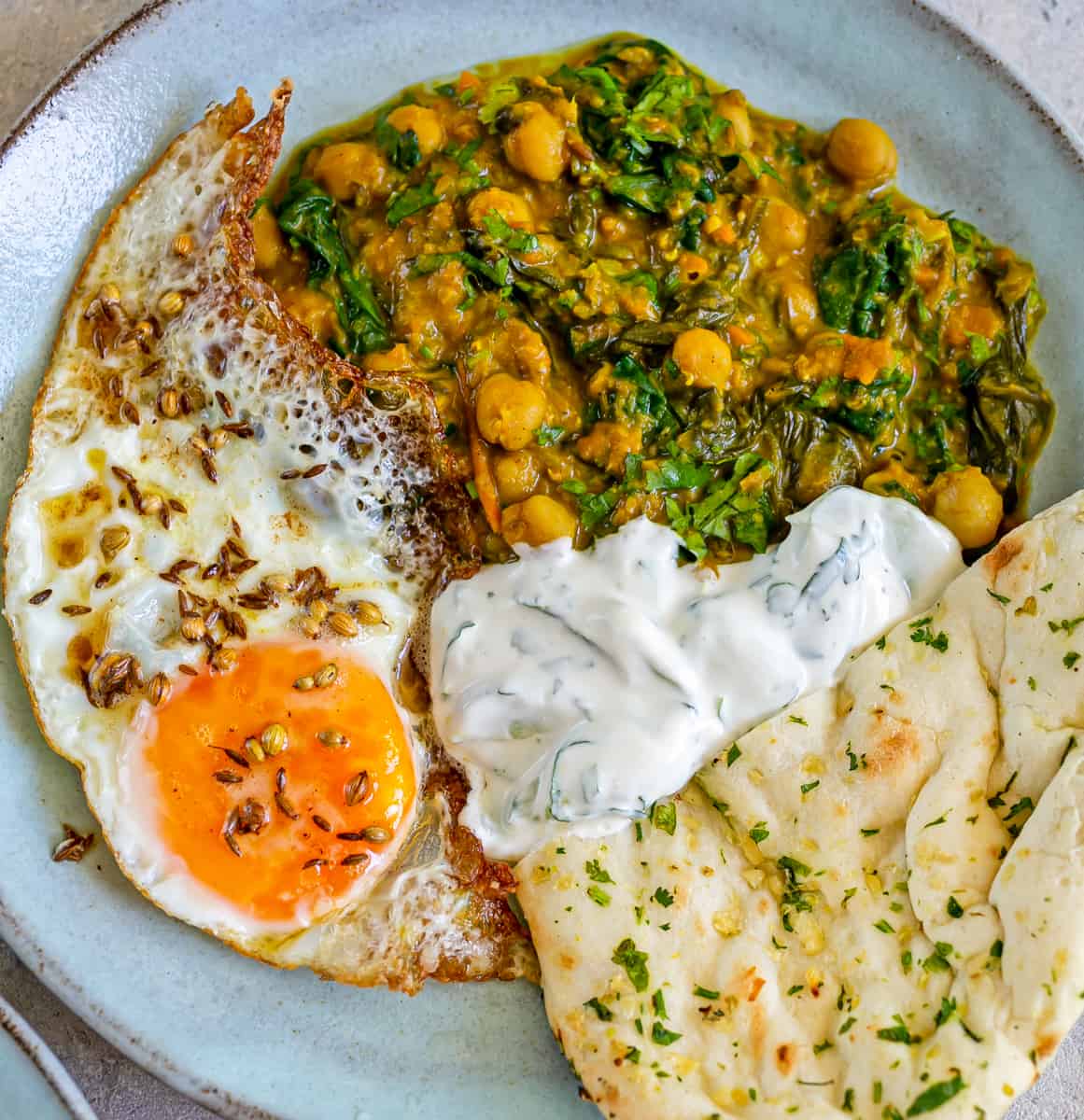 Chickpea Spinach Curry with Fried Eggs