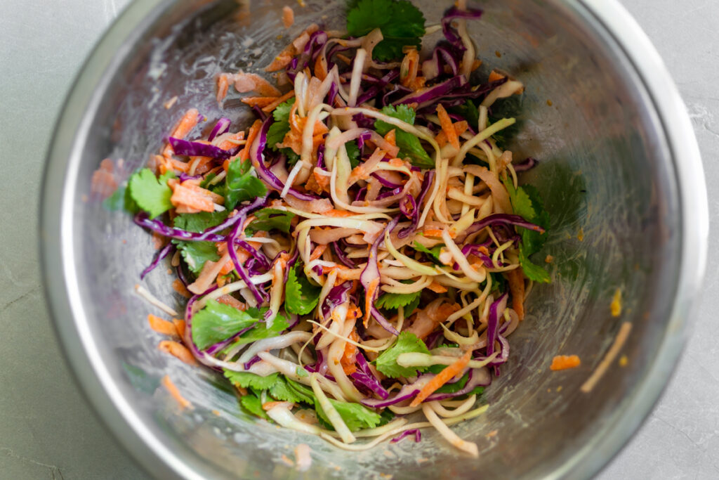 Lime Pickle Coleslaw in a silver bowl