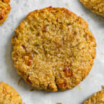 close up of a Buttery Oat Apricot Fennel biscuit on a baking tray