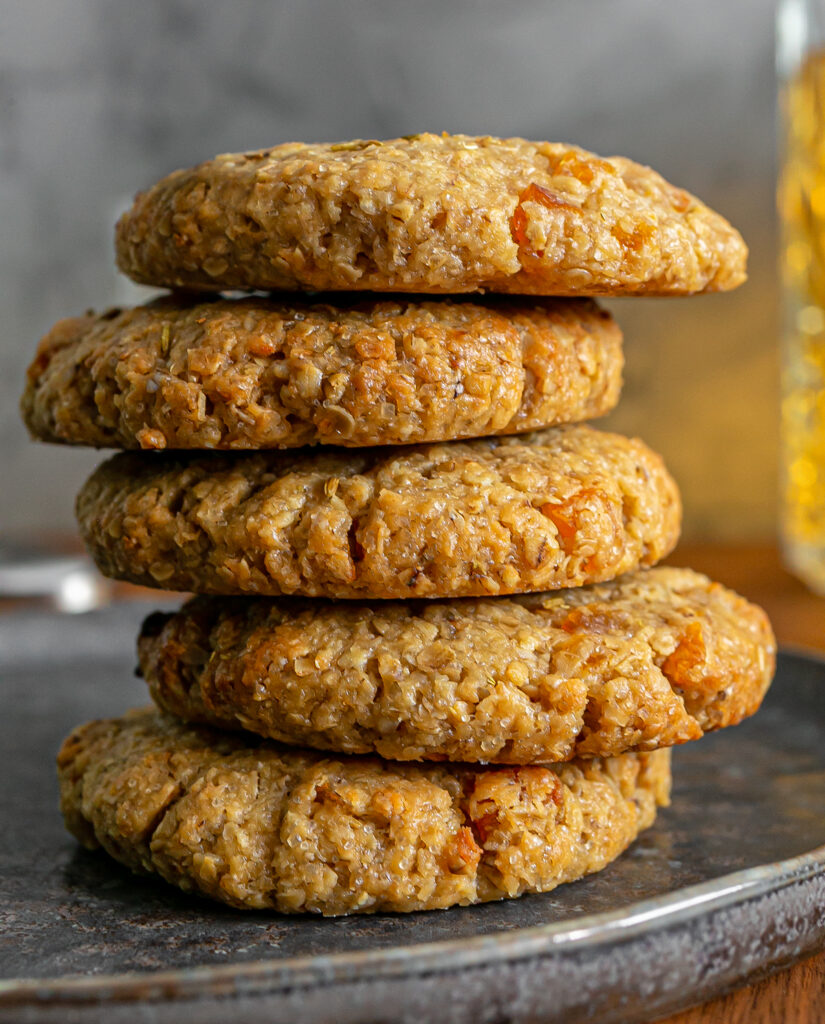5 Buttery Oat Apricot Fennel biscuits stacked on top of each other