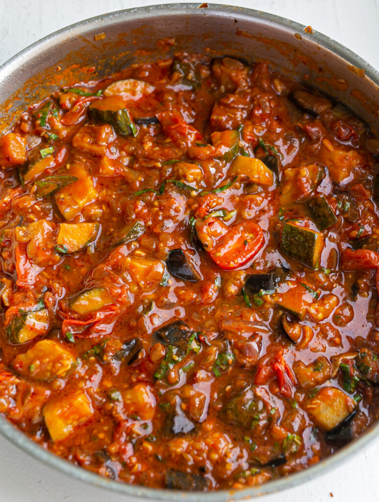 large pan filled with Spicy Aubergine Nduja Ragu