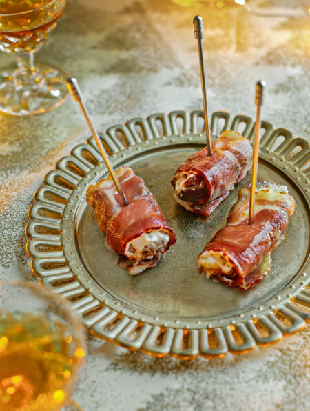 Antique gold plate with Brandy Soaked Dates In Bacon