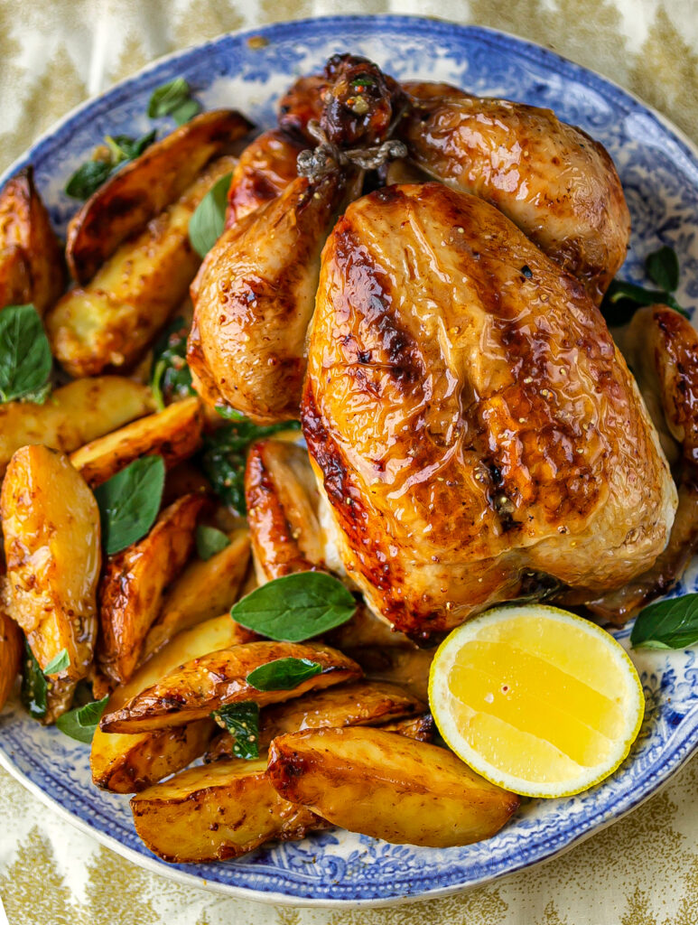 Large Italian plate of Roast Chicken with Vermouth, Oregano and lemon roasted potatoes